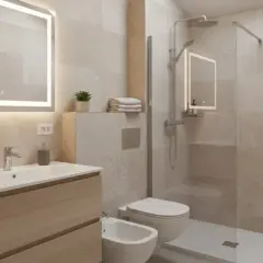 Bagno moderno con lavabo, bidet e doccia. Un secondo bagno piccolissimo, ma funzionale, con specchio illuminato e finiture in legno chiaro.