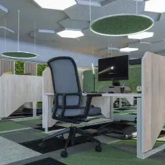 Ufficio moderno con pareti verdi, soffitto esagonale e tappeto geometrico. Ottime idee arredamento ufficio per un ambiente stimolante.