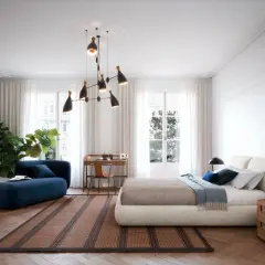 Elegante camera da letto con divanetto blu, letto moderno e scrivania. Idee originali per un ambiente sofisticato e accogliente.