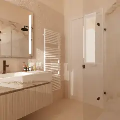 Un bagno elegante e raffinato con lavabo in marmo, specchio illuminato, doccia in cristallo e scaldasalviette.