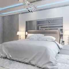 Testata letto moderna con pannelli in cartongesso e specchi, perfetta per idee camera da letto eleganti.
