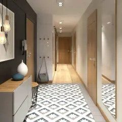 Un corridoio moderno e accogliente, perfetto per arredare con stile. Tappeto geometrico, mobili essenziali e luci d'atmosfera creano un'entrata invitante.