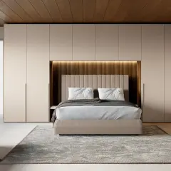 Idee per riporre la camera da letto: armadi a muro con cabina armadio integrata, letto contenitore e panca contenitiva.