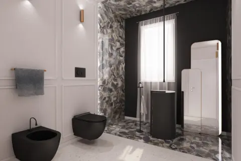 Elegante bagno bianco e nero con sanitari sospesi, rivestimenti in pietra naturale e specchi moderni.