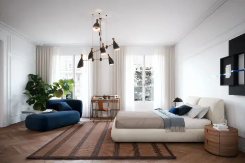 Elegante camera da letto con divanetto blu, letto moderno e scrivania. Idee originali per un ambiente sofisticato e accogliente.