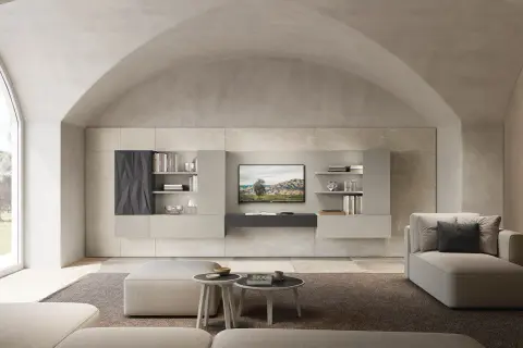 Soggiorno moderno con parete attrezzata in un elegante colore taupe abbinamento. Divani e pouf in tonalità neutre creano un'atmosfera rilassante.