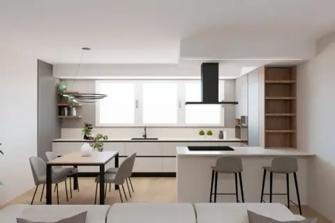 Elegante cucina open space con isola, bancone snack, tavolo da pranzo e cappa nera.