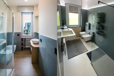 Bagno piccolo stretto con doccia in vetro, lavabo moderno e sanitari sospesi. Pareti grigie e pavimento in legno chiaro.