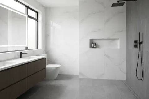 Bagni moderni con doccia a pavimento, doppio lavabo, specchio illuminato e nicchia portaoggetti.