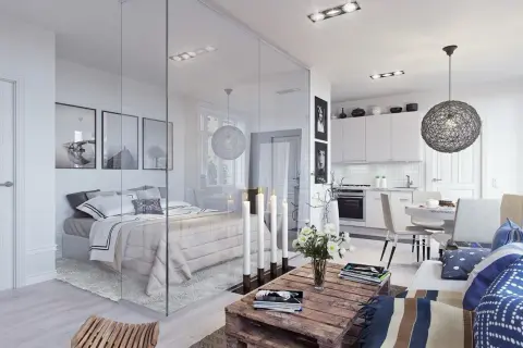 Un progetto di casa 50 mq con zona notte separata da un vetro, cucina a vista e soggiorno accogliente.
