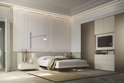Camera da letto moderna con pareti decorate, letto king-size, comodini minimalisti e armadio a muro. Ottime idee pareti camera da letto moderna.