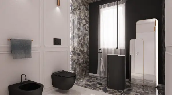 Elegante bagno bianco e nero con sanitari sospesi, rivestimenti in pietra naturale e specchi moderni.