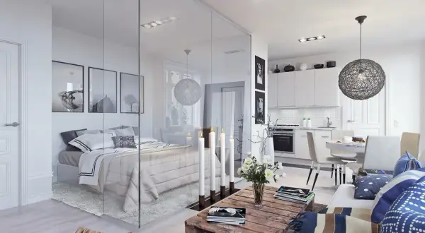 Un progetto di casa 50 mq con zona notte separata da un vetro, cucina a vista e soggiorno accogliente.