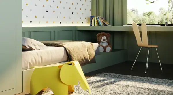 Arredamento camera neonato: letto accogliente, sgabello a forma di elefante giallo, orsacchiotto e scrivania con vista sul verde.
