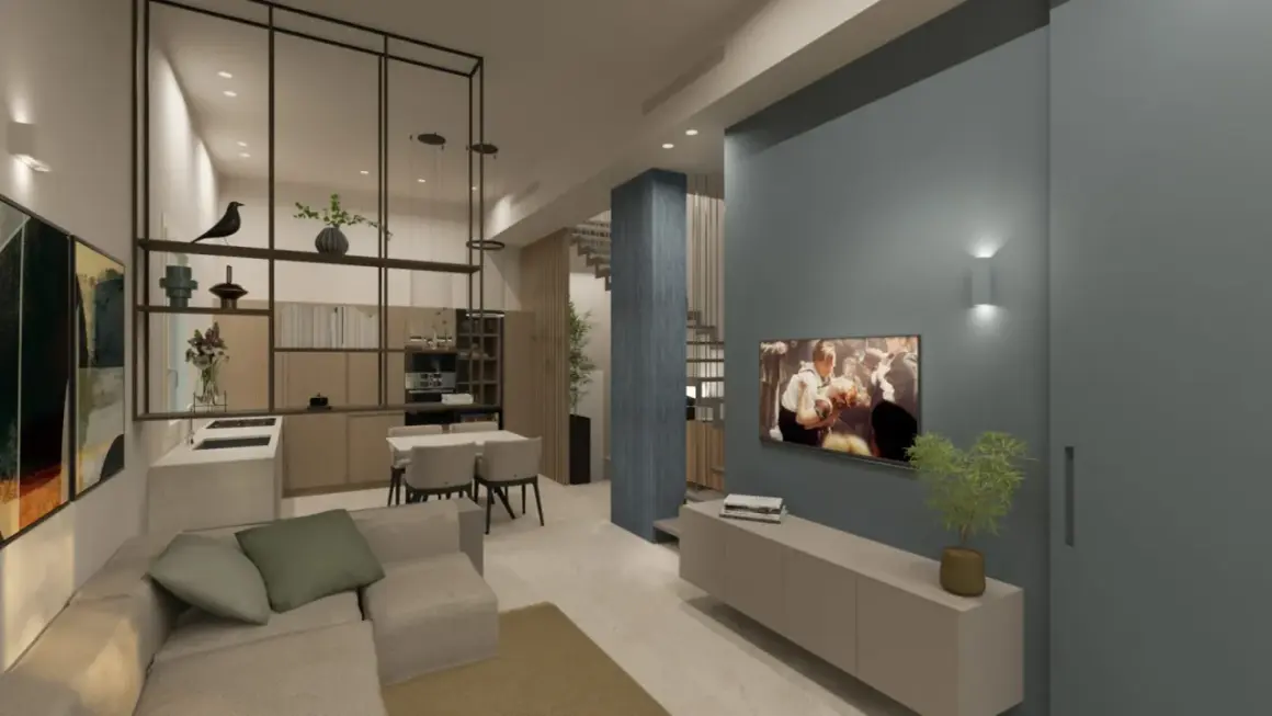 Soggiorno e cucina open space in stile japandi, con divano, tavolo da pranzo, mobili in legno e un'elegante parete blu con TV.