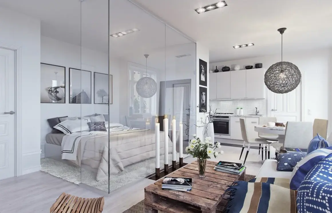 Un progetto di casa 50 mq con zona notte separata da un vetro, cucina a vista e soggiorno accogliente.