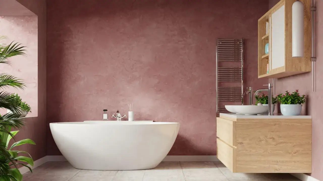 Bagno moderno con vasca freestanding e mobile lavabo in legno. Pareti color tortora creano un'atmosfera rilassante, perfette per idee pittura bagno.