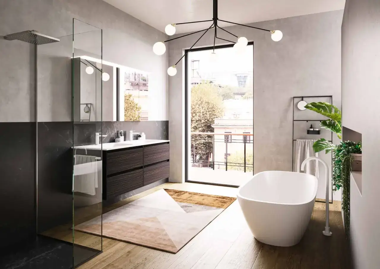 Bagno moderno con vasca freestanding, doppio lavabo e doccia walk-in. Tonalit&agrave; neutre e materiali naturali creano un'atmosfera di colore bagno rilassante.