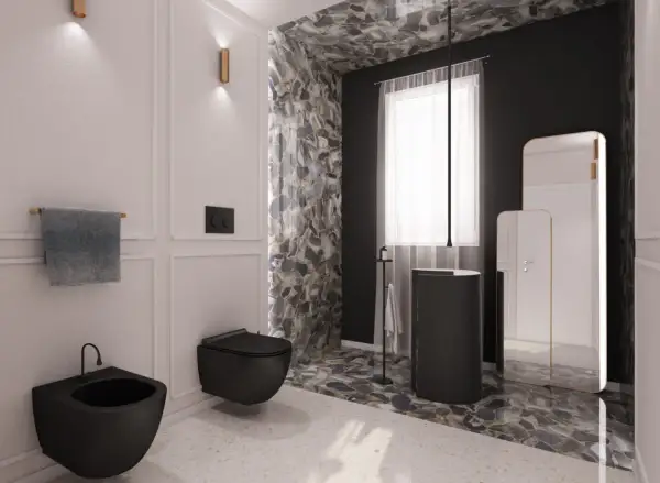 Elegante bagno bianco e nero con sanitari sospesi, rivestimenti in pietra naturale e specchi moderni.