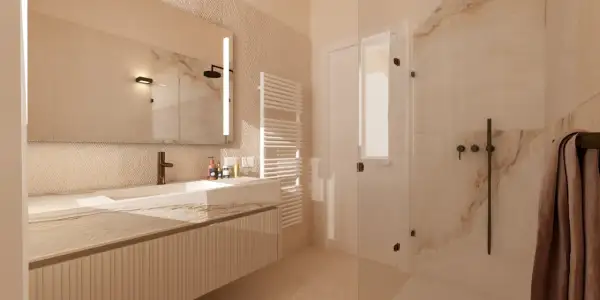 Un bagno elegante e raffinato con lavabo in marmo, specchio illuminato, doccia in cristallo e scaldasalviette.