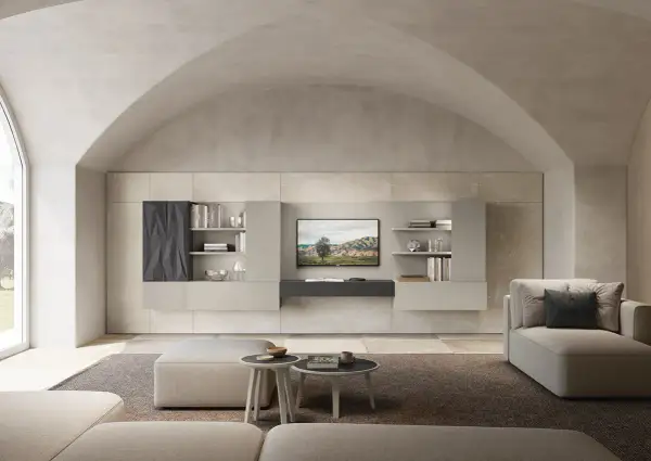 Soggiorno moderno con parete attrezzata in un elegante colore taupe abbinamento. Divani e pouf in tonalità neutre creano un'atmosfera rilassante.