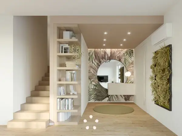 Ingresso casa con libreria in legno, specchio rotondo su carta da parati tropicale e parete verde. Idee d'arredo moderne e accoglienti.